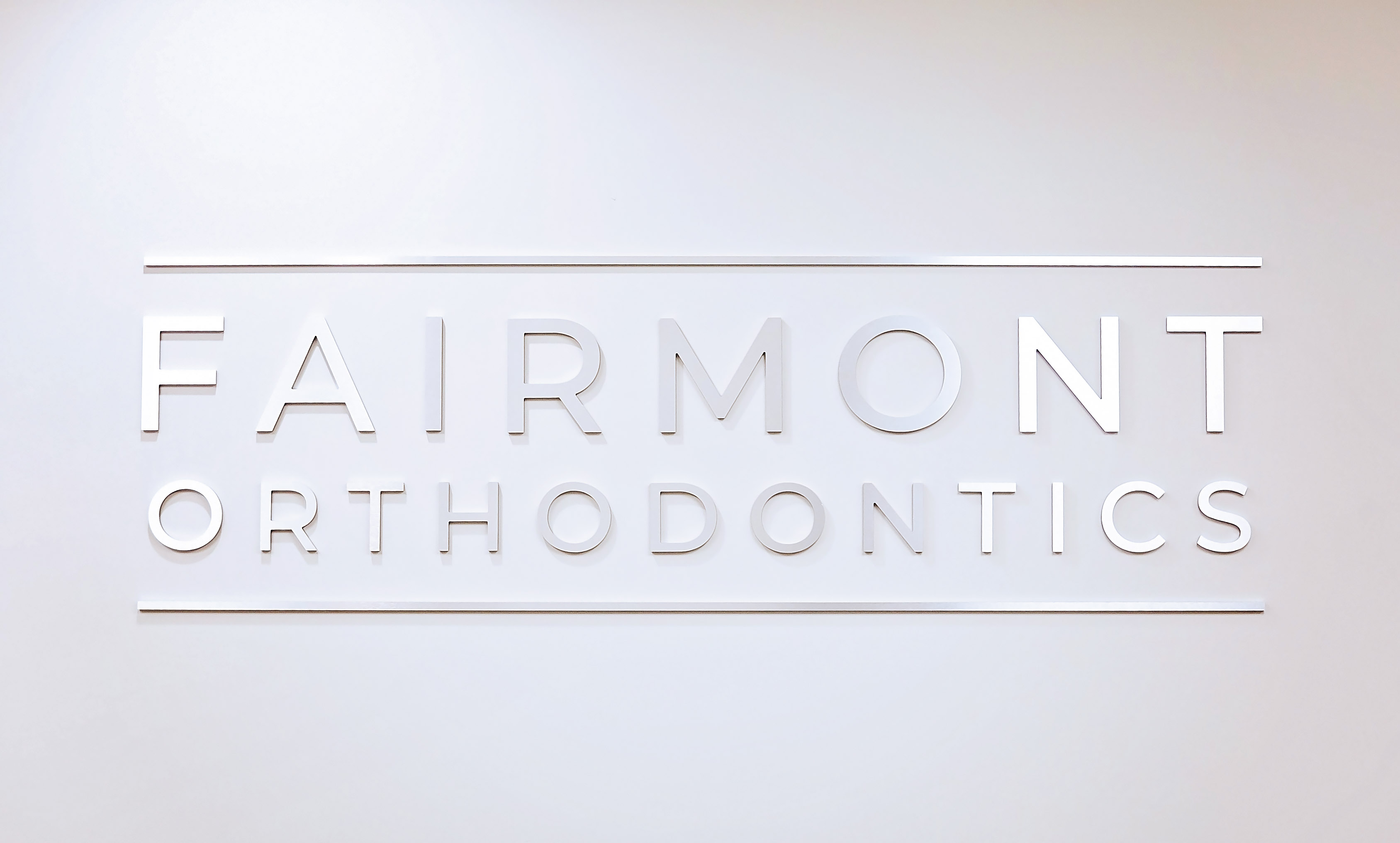 Fairmont Orthodontics logo